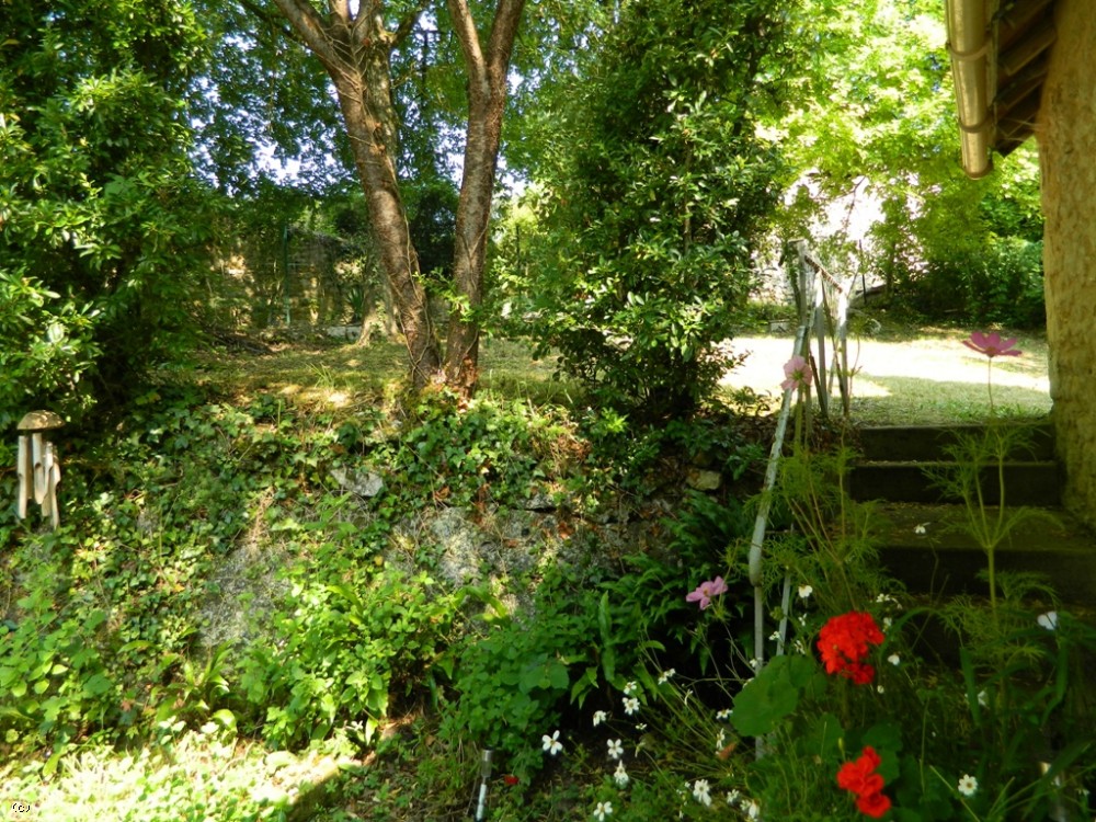 Attractive late 18th century cottage with swimming pool and large garden