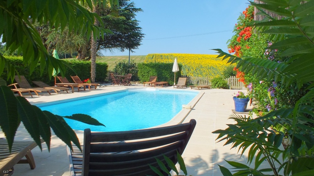Restored farmhouse with established gite business, 2 swimming pools and 3.5ha