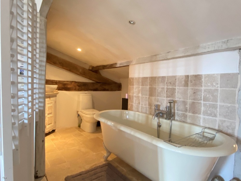 Substantial converted barn with integral guest apartment, heated swimming pool, garaging and 2ha